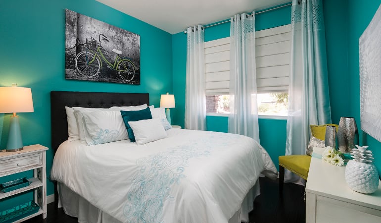 Roman shades in a St. George bedroom